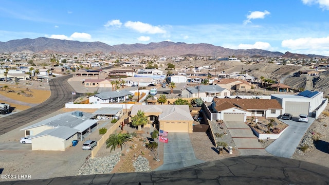 aerial view featuring a mountain view and a residential view