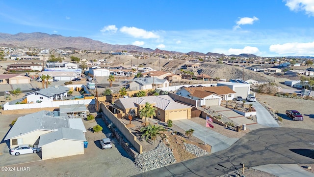 drone / aerial view with a mountain view and a residential view