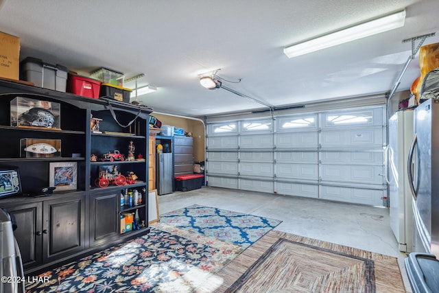 garage featuring a garage door opener