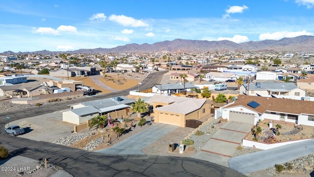 birds eye view of property featuring a residential view and a mountain view