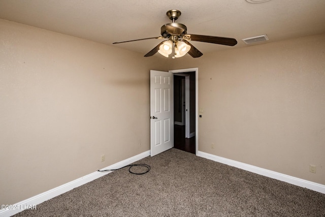 unfurnished room with carpet flooring and ceiling fan