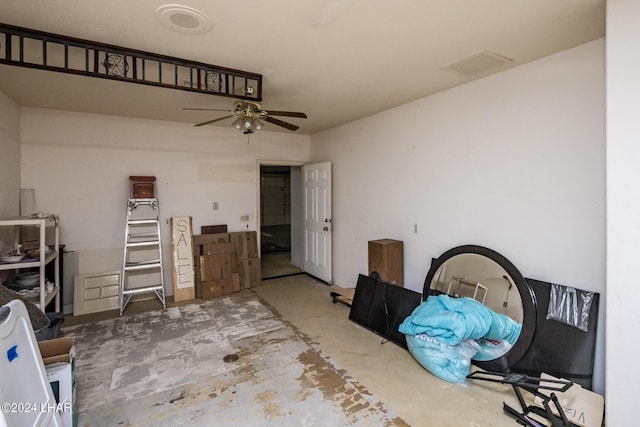 interior space featuring concrete flooring and ceiling fan