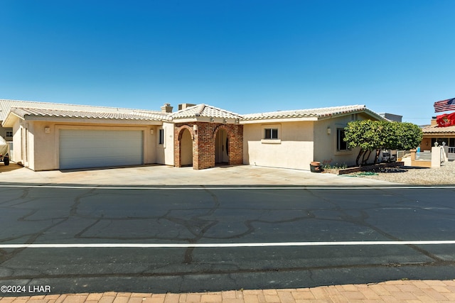 view of front of home with a garage