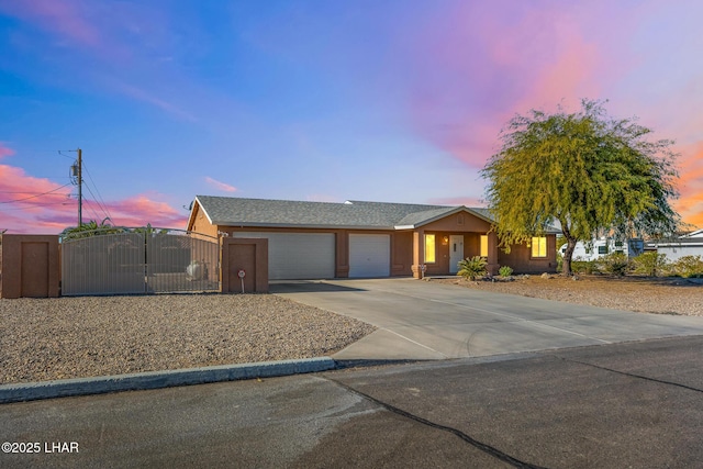 view of front of property with a garage