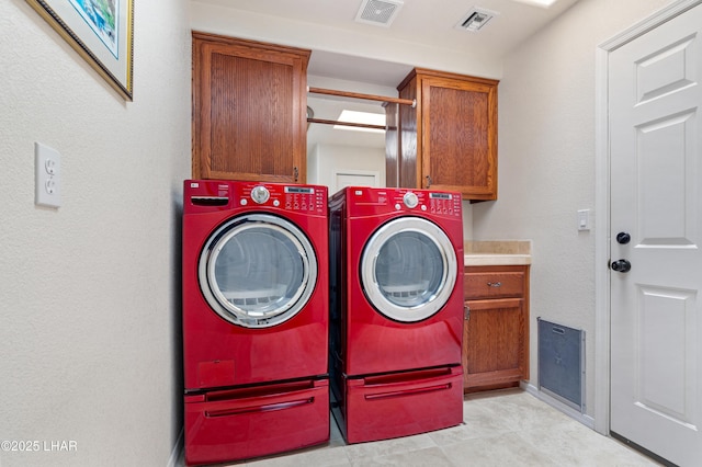 1901 Gold Dust Dr, Lake Havasu City, AZ 86404 - washroom featuring cabinet space, washer and clothes dryer, light tile patterned floors, and baseboards