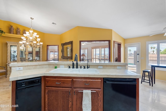 1901 Gold Dust Dr, Lake Havasu City, AZ 86404 - kitchen featuring dishwasher, lofted ceiling, a sink, light tile patterned floors, and light countertops