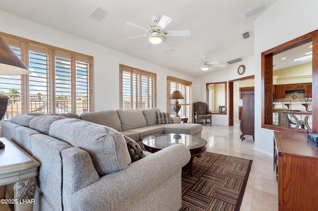 1901 Gold Dust Dr, Lake Havasu City, AZ 86404 - living room with ceiling fan, light tile patterned flooring, vaulted ceiling, and baseboards