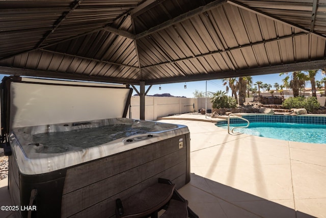 2008 Martinique Dr, Lake Havasu City, AZ 86406 - view of pool featuring a hot tub, a patio area, and a gazebo