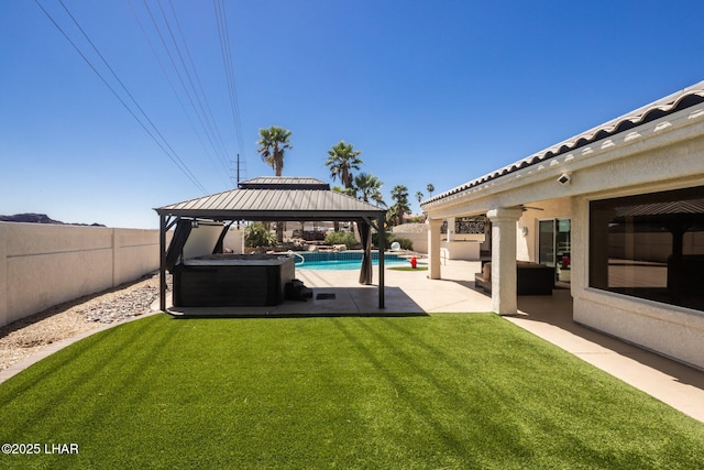 2008 Martinique Dr, Lake Havasu City, AZ 86406 - fenced backyard with a gazebo, a patio, a hot tub, and ceiling fan
