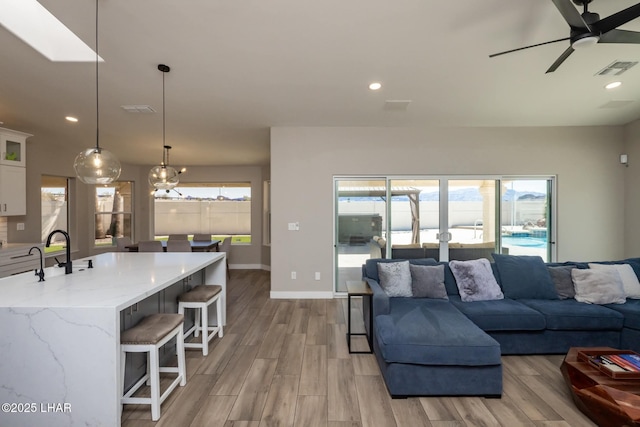 2008 Martinique Dr, Lake Havasu City, AZ 86406 - living area with a ceiling fan, light wood-style flooring, and recessed lighting