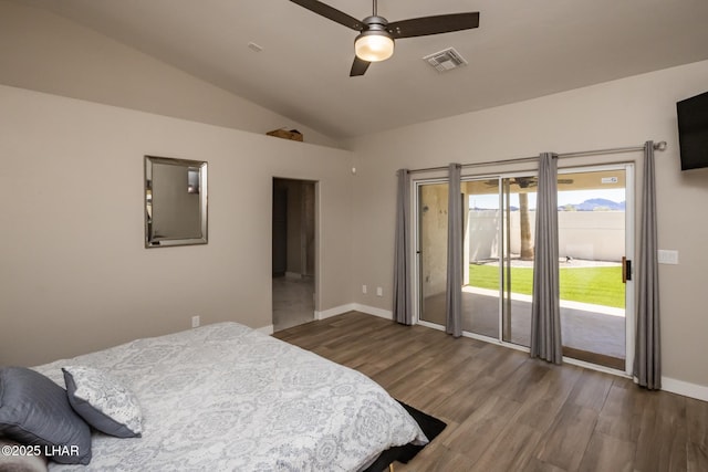 2008 Martinique Dr, Lake Havasu City, AZ 86406 - bedroom with access to exterior, dark wood-style floors, vaulted ceiling, and a ceiling fan