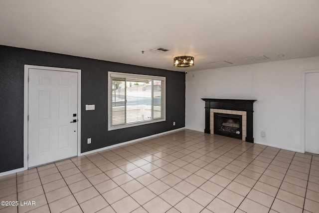 2230 Havasupai Blvd, Lake Havasu City, AZ 86403 - unfurnished living room with a tile fireplace and light tile patterned flooring
