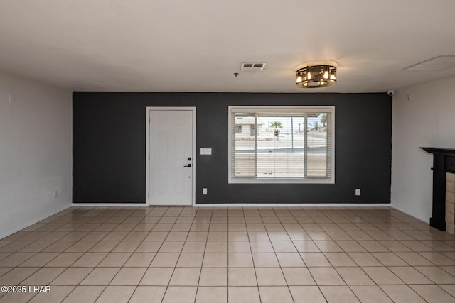 2230 Havasupai Blvd, Lake Havasu City, AZ 86403 - unfurnished living room featuring light tile patterned floors