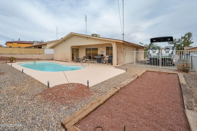 view of pool featuring area for grilling, a patio area, a fenced backyard, and a fenced in pool