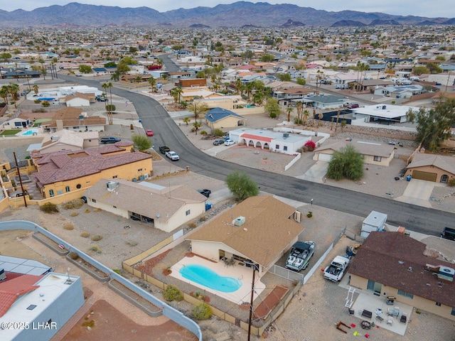 bird's eye view with a residential view and a mountain view