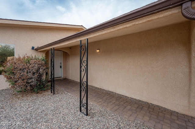 exterior space featuring stucco siding