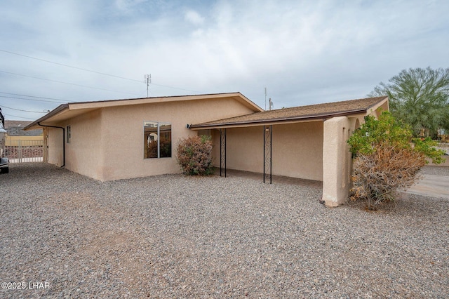 exterior space with stucco siding