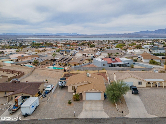 birds eye view of property featuring a residential view and a mountain view