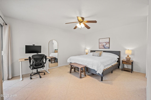 bedroom with tile patterned flooring, ceiling fan, and baseboards