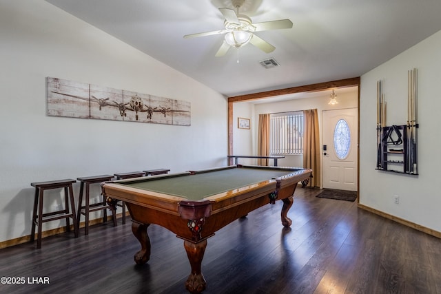 game room featuring ceiling fan, dark wood-type flooring, visible vents, baseboards, and vaulted ceiling