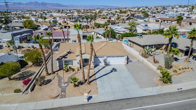 aerial view featuring a residential view and a mountain view