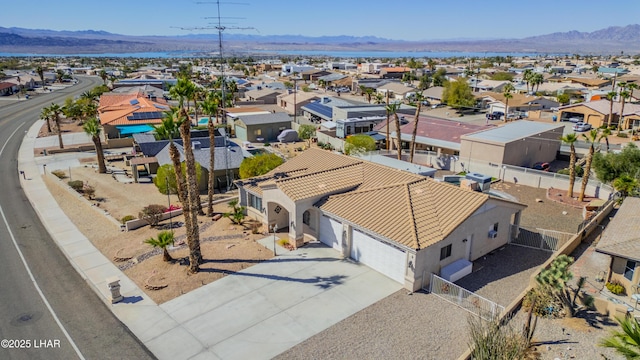 aerial view with a residential view and a mountain view