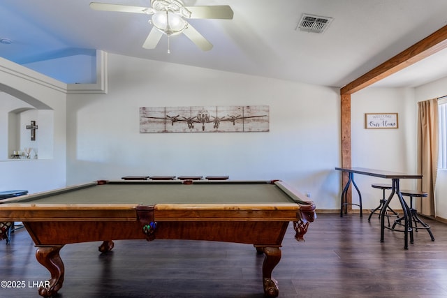 recreation room featuring lofted ceiling, ceiling fan, dark wood-style flooring, visible vents, and baseboards