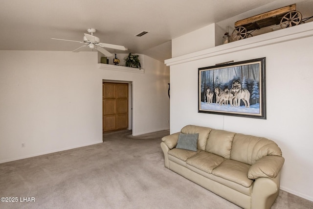 living room with ceiling fan, carpet, lofted ceiling, and visible vents