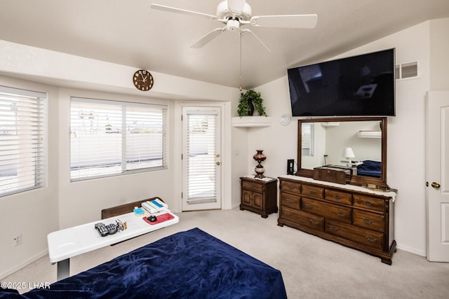 carpeted bedroom featuring lofted ceiling, access to outside, ceiling fan, and visible vents