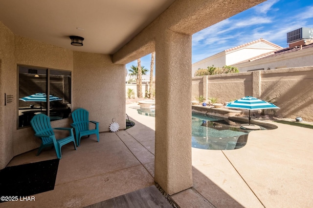 view of patio / terrace with cooling unit, a fenced in pool, and a fenced backyard