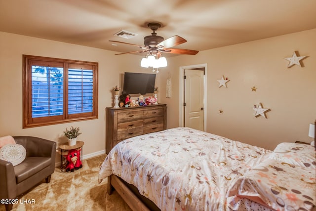 bedroom featuring visible vents, baseboards, carpet, and a ceiling fan