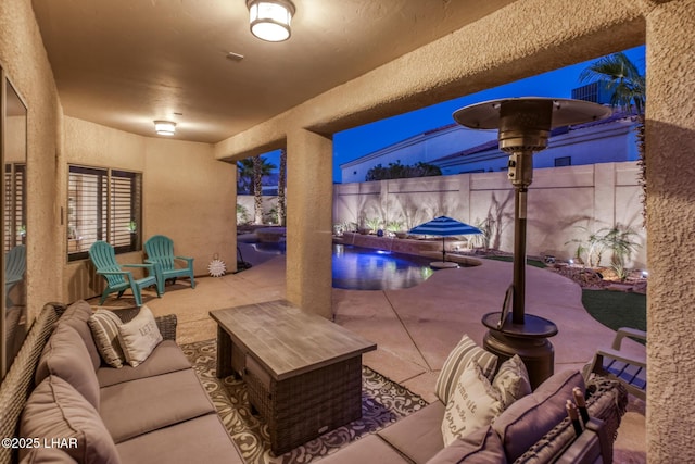 view of patio with a fenced in pool, outdoor lounge area, and fence