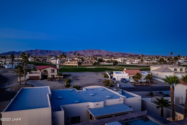 aerial view featuring a mountain view and a residential view