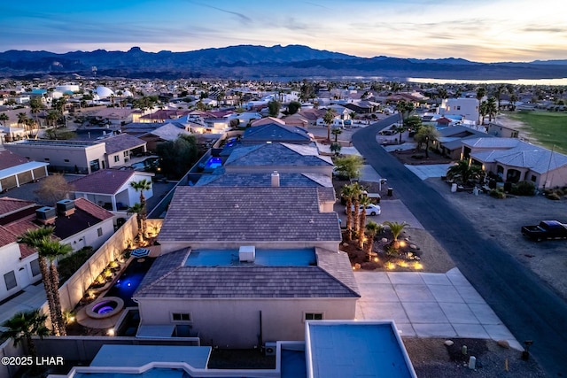 bird's eye view featuring a mountain view and a residential view