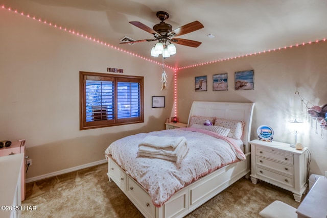 carpeted bedroom with a ceiling fan, baseboards, and visible vents