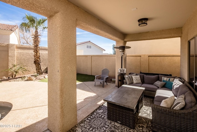 view of patio / terrace with a fenced backyard and outdoor lounge area