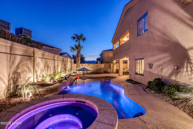 view of swimming pool featuring central AC unit, a fenced in pool, an in ground hot tub, a fenced backyard, and a patio area