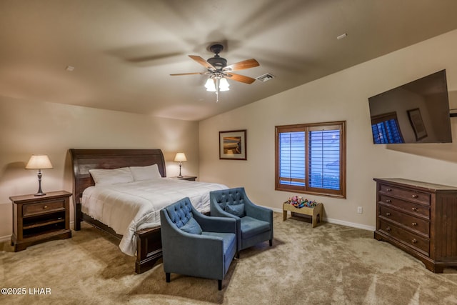 bedroom with visible vents, carpet floors, baseboards, ceiling fan, and vaulted ceiling