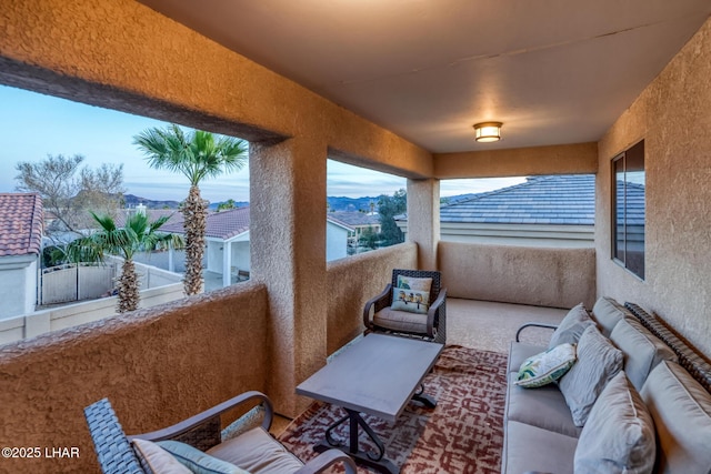 view of patio / terrace featuring outdoor lounge area and a balcony