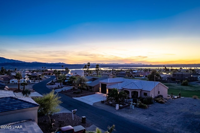 bird's eye view with a residential view and a mountain view