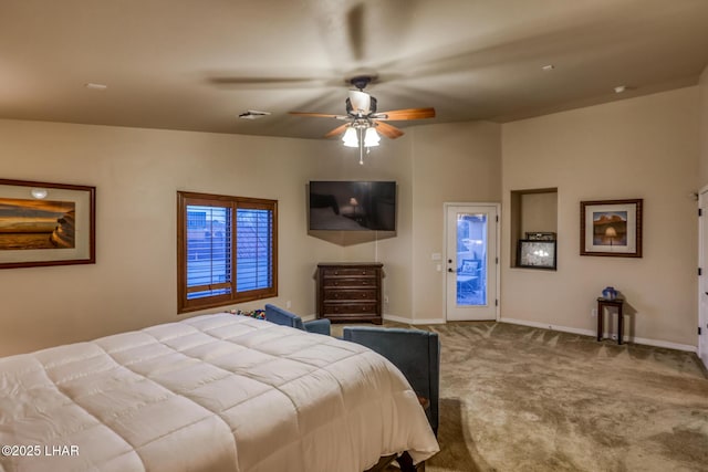 bedroom featuring a ceiling fan, baseboards, visible vents, access to exterior, and carpet flooring