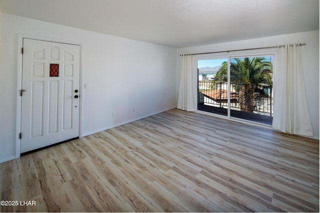 unfurnished room featuring wood finished floors