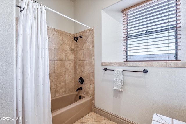 bathroom with tile patterned floors and shower / bath combination with curtain