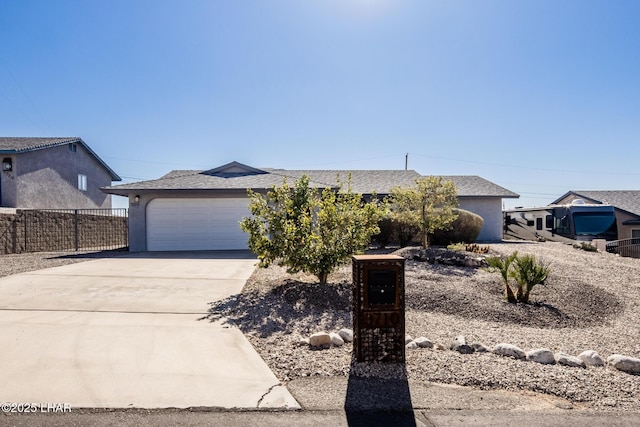 single story home with a garage