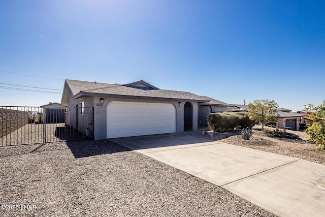 ranch-style home with a garage