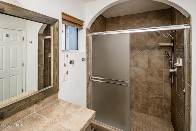 bathroom featuring walk in shower