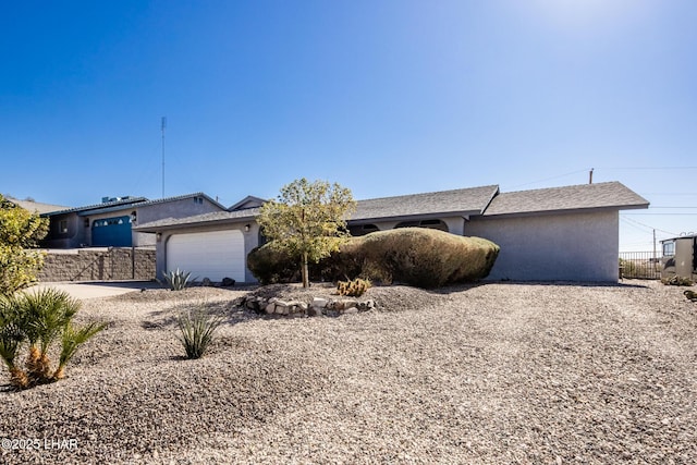 ranch-style house with a garage