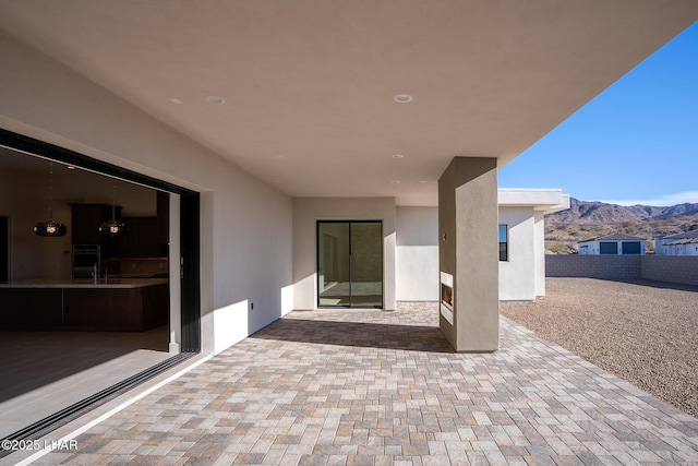 view of patio featuring a mountain view