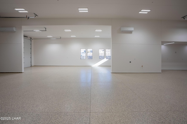 empty room featuring a wall mounted AC