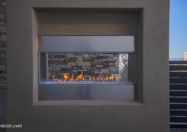 interior details featuring a fireplace